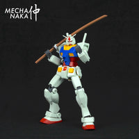 MechaNaka's Gunpla weapon - A miniature wooden training katana, often used by swordsmanship practitioners.