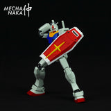 MechaNaka's Gunpla weapon - A miniature shield modeled after those used by Gundam and GM type mobile suits. Features a forearm connecting pin (diameter: 3mm for HG / 4.5mm for MG), a rotatable hand grip, and a slidable shield-to-arm connector. Especially suitable to add to your E.F.S.F type Gunpla!